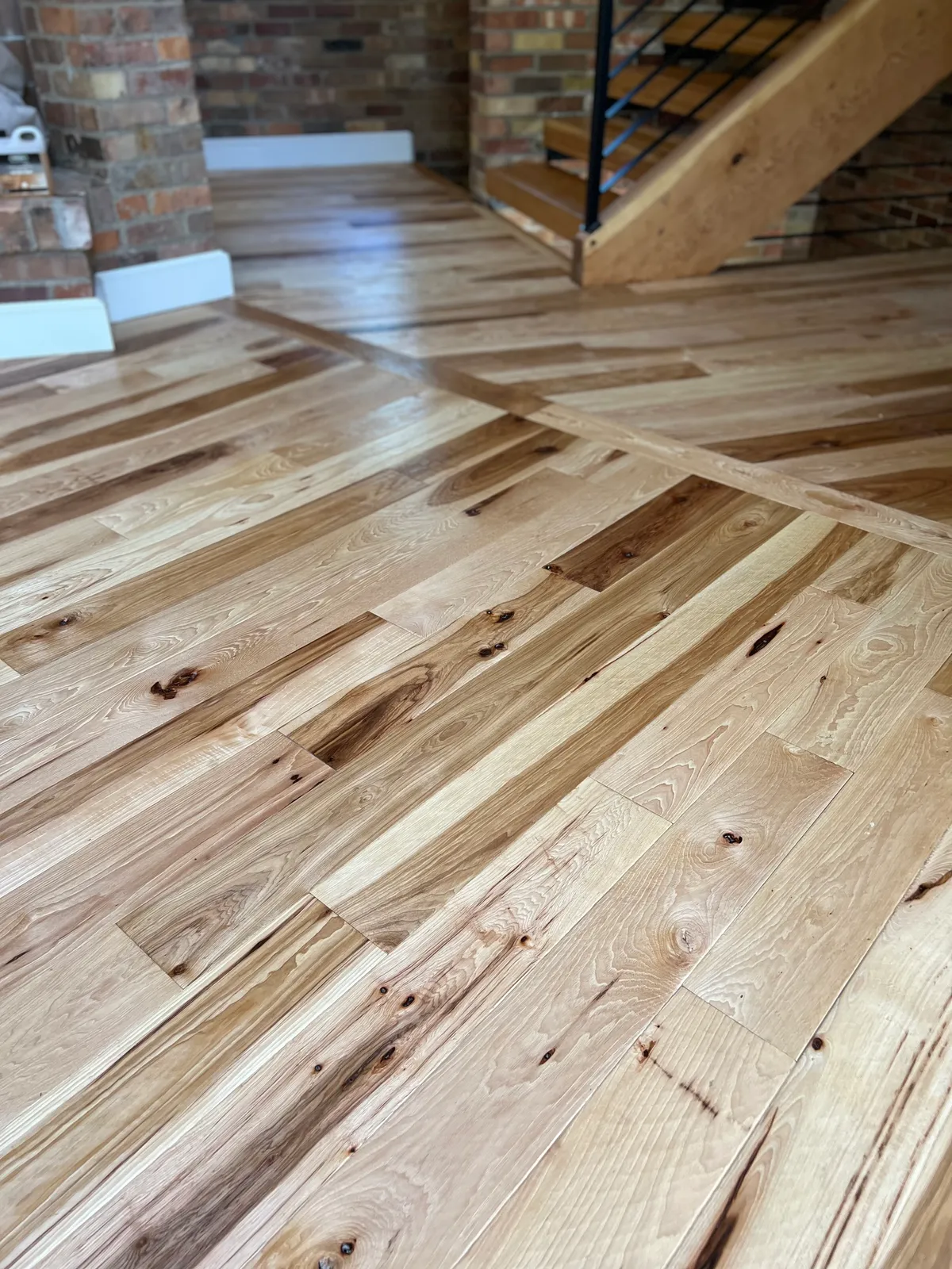 Close view of hardwood floor grain and finish detail