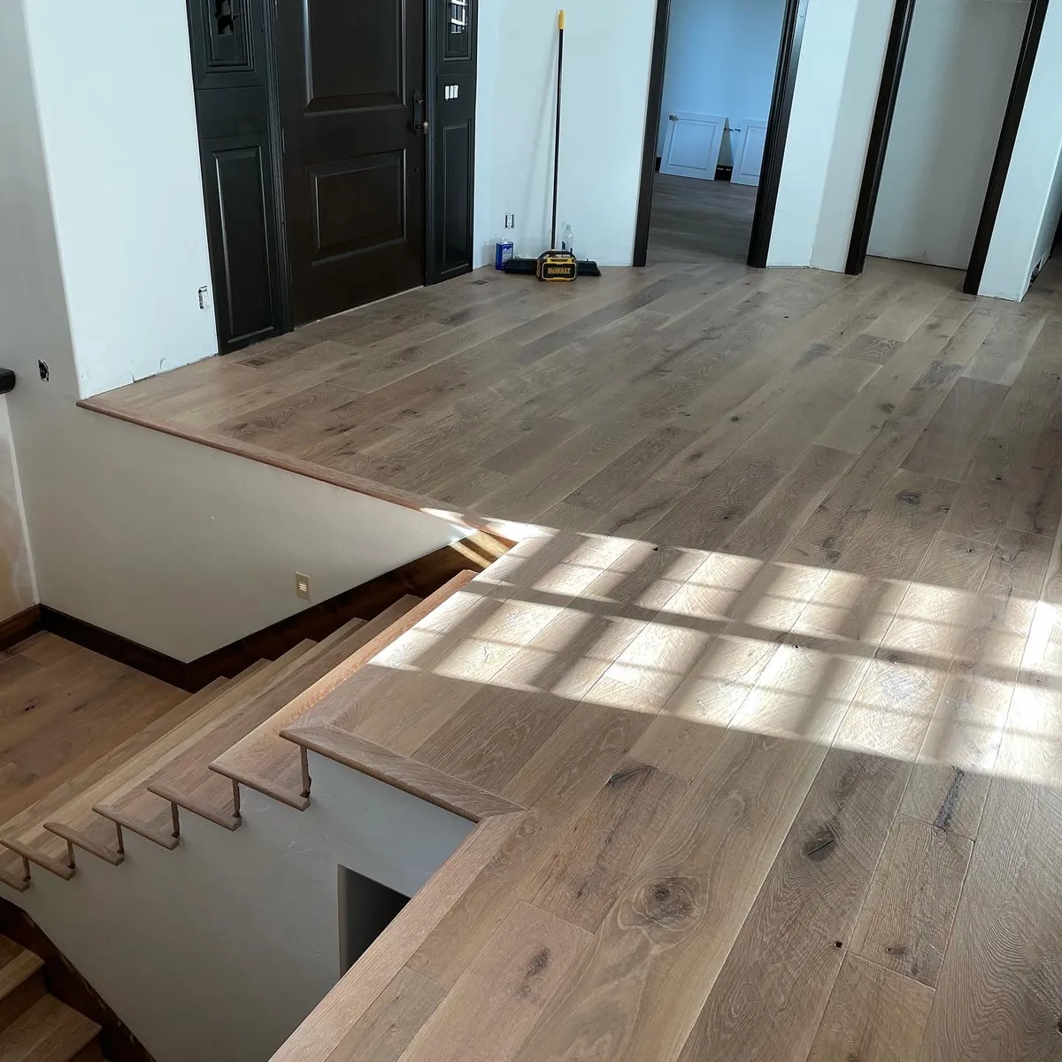 Classic Davis County style entry with hardwood flooring