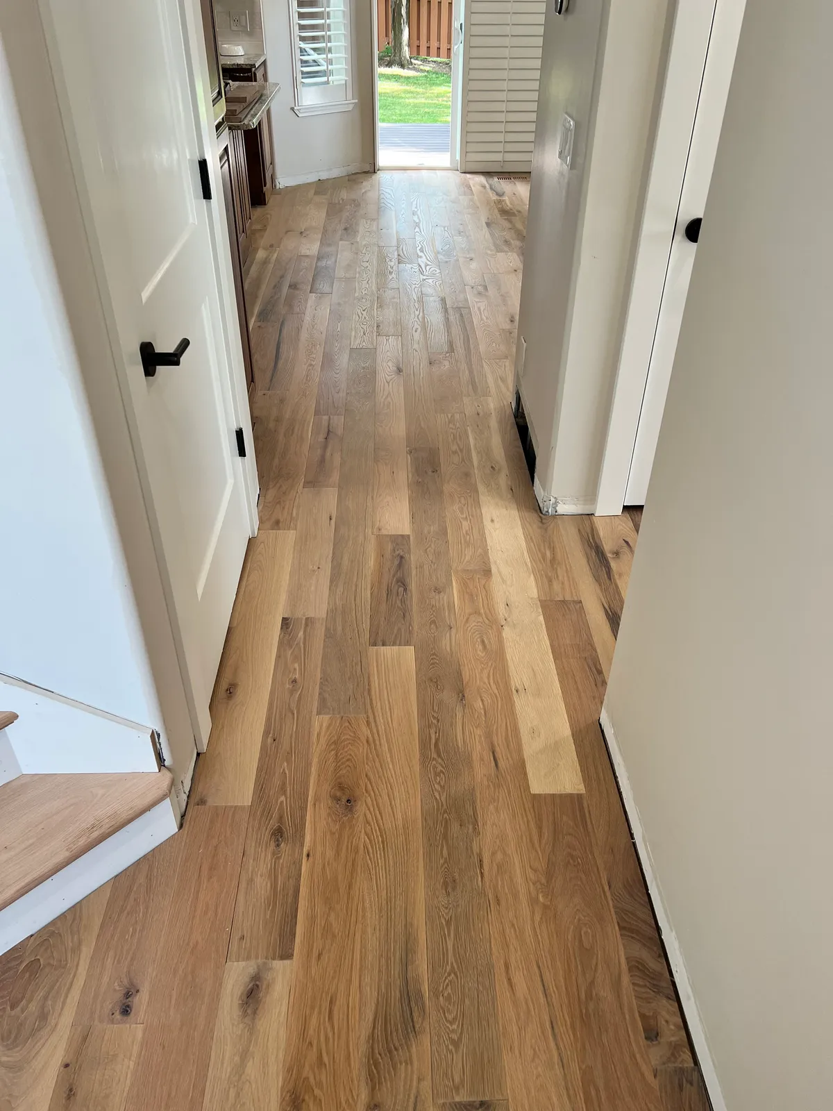 Hallway with hardwood floors