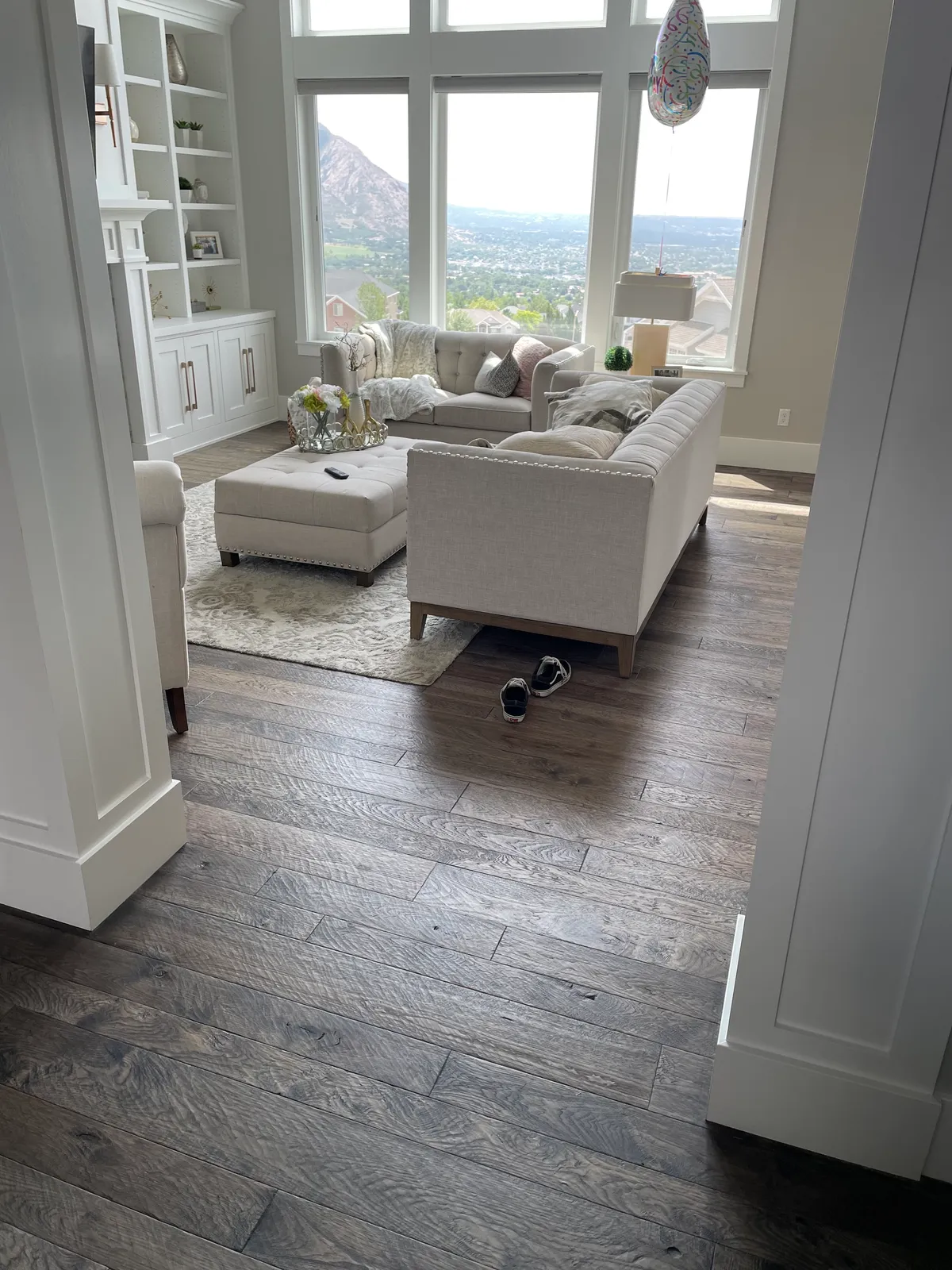 Furnished living room with hardwood floors