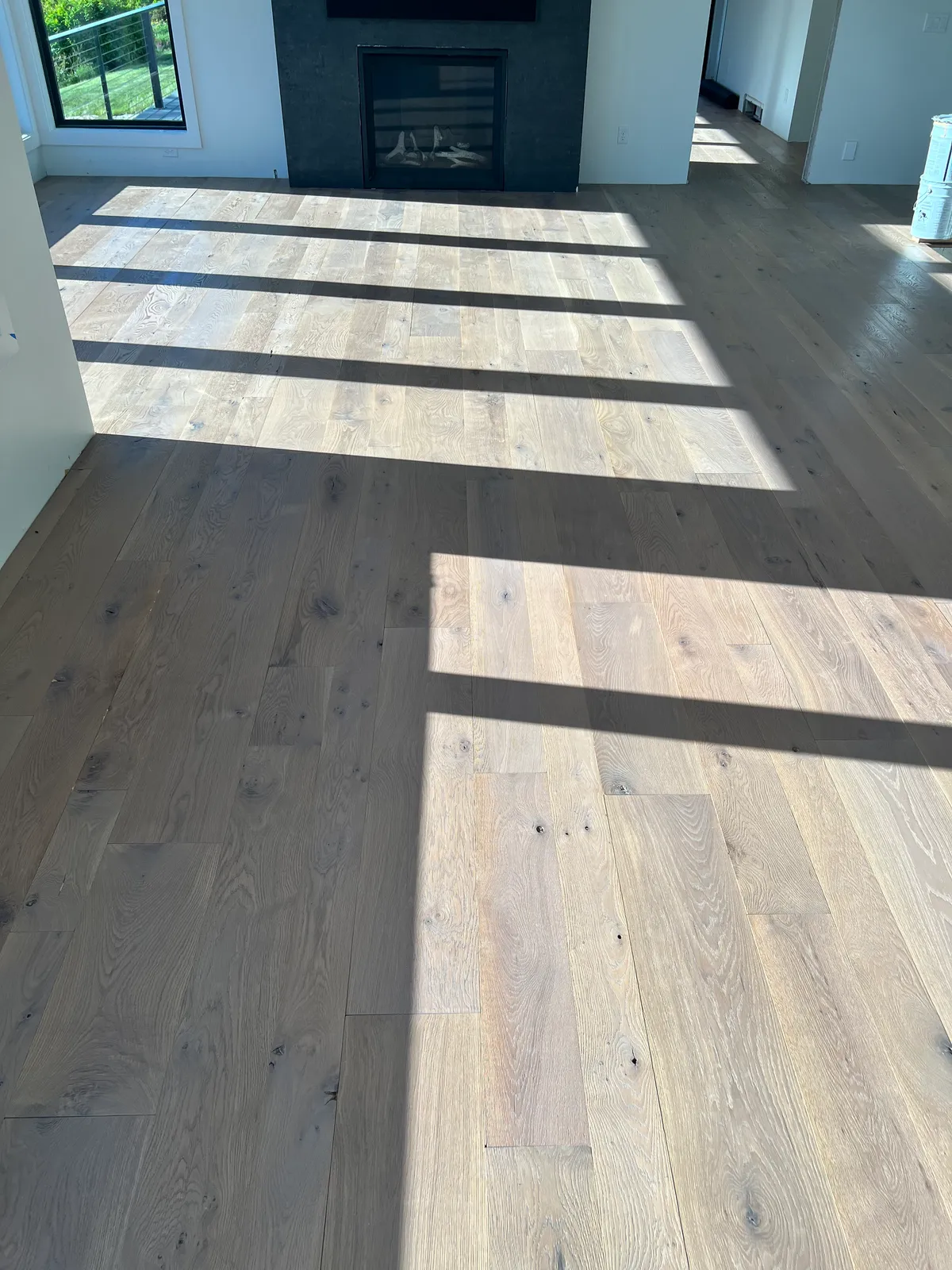 Bright living room with warm wood flooring