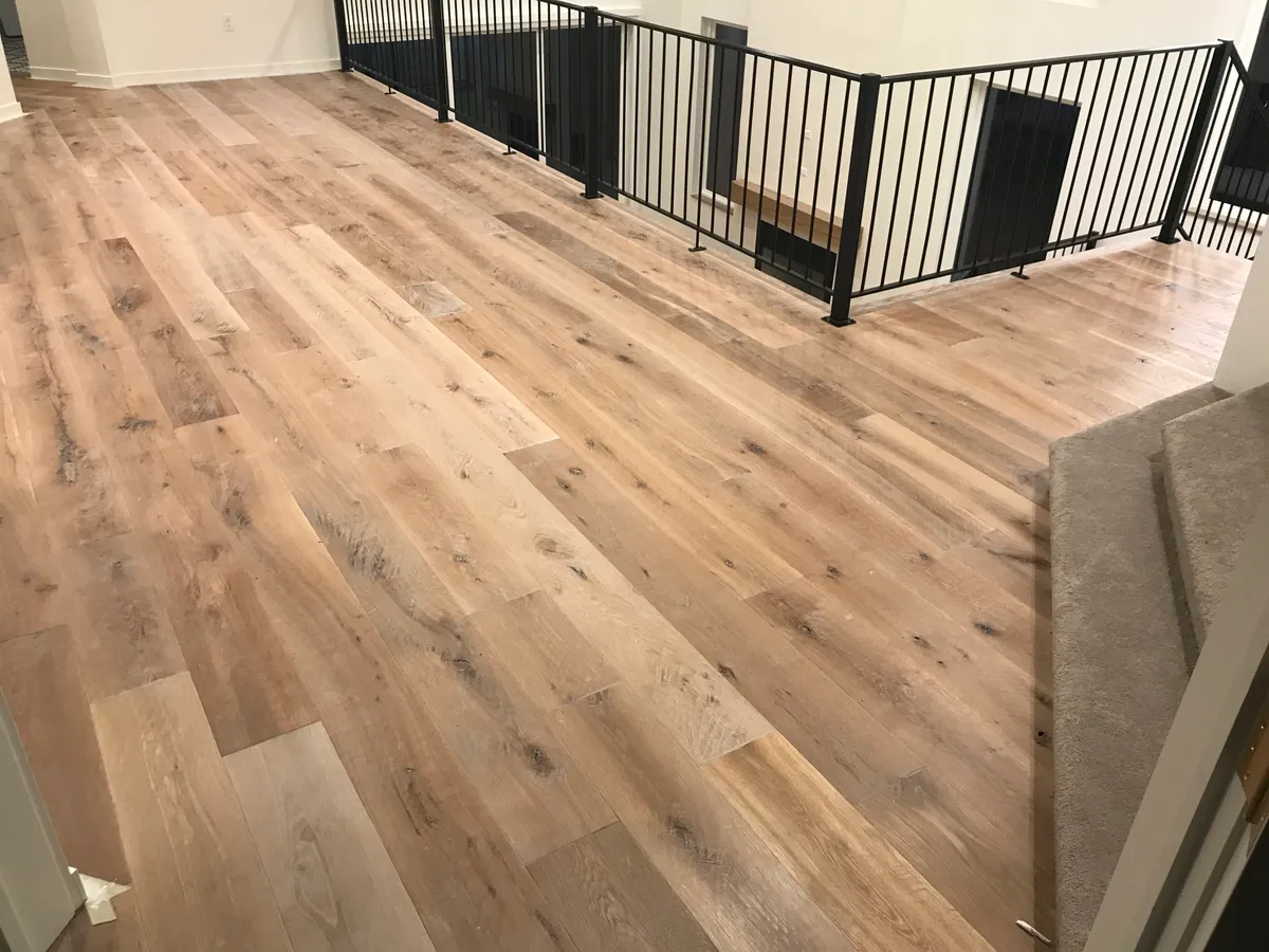 Hardwood staircase landing in new build home